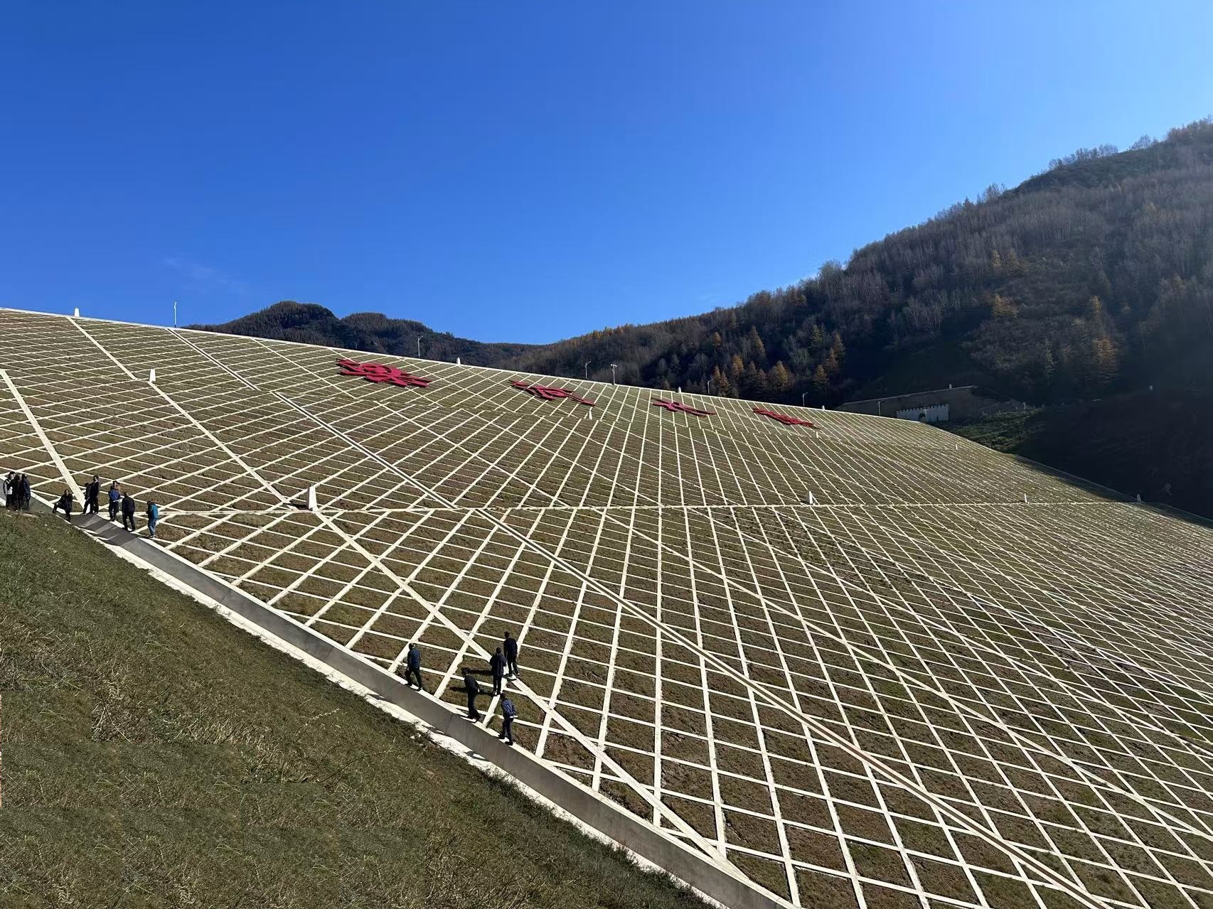 產投集團水建公司承建的梁河水庫工程順利通過下閘蓄水驗收(圖1)